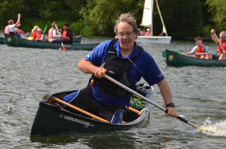 instructor in a canoe