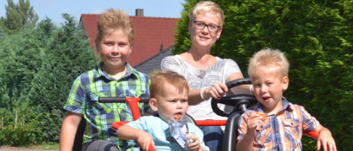 Family riding a Nature Buggy